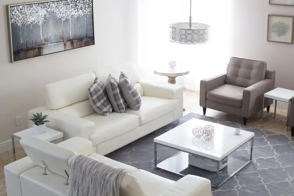Living room with a sofa (representative photo)
