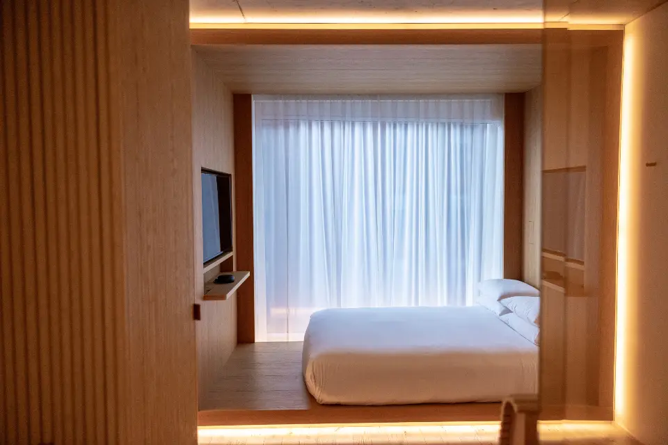 Furnished bedroom with warm light (representative photo)